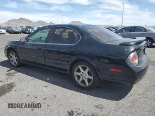 2002 Nissan Maxima GXE z VIN JN1DA31D62T404510, wystawiony jako Copart lot #51367005 z przebiegiem 185 156 mil mil oraz Czysty tytuł • Clean title. Historia ofert i sprzedaży dostępna na DreamBid. Obrazek 2.