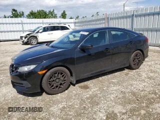 2017 Honda Civic LX z VIN 2HGFC2F58HH016102, wystawiony jako Copart lot #57521074 z przebiegiem 215 859 mil mil oraz Szkoda całkowita • Salvage title. Historia ofert i sprzedaży dostępna na DreamBid. Obrazek 1.
