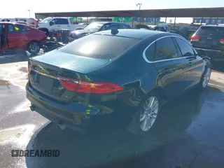 2017 Jaguar XF 35t Prestige with VIN SAJBE4BV0HCY47218, listed as a IAAI auction lot 41040063 with 100,823 mi miles. Bid and sale history available at carsss.com. Image 4.
