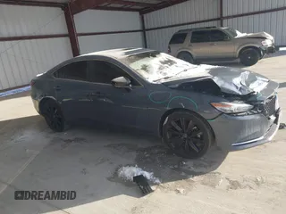2021 Mazda 6 Carbon Edition with VIN JM1GL1WY6M1616617, listed as a IAAI auction lot 41365615 with 60,747 mi miles and . Bid and sale history available at DreamBid. Image 13.