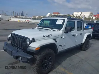2022 Jeep Gladiator Texas Trail with VIN 1C6HJTAG1NL148524, listed as a IAAI auction lot 42128920 with 42,004 mi miles. Bid and sale history available at carsss.com. Image 2.