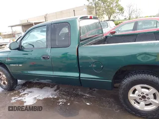 2001 Dodge Dakota with VIN 1B7GL22X11S284210, listed as a IAAI auction lot 41630417 with 206,484 mi miles. Bid and sale history available at carsss.com. Image 14.