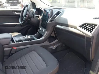 2022 Ford Edge SE z VIN 2FMPK4G90NBA64707, wystawiony jako IAAI lot #42194899 z przebiegiem 87 387 mil mil oraz . Historia ofert i sprzedaży dostępna na DreamBid. Obrazek 5.