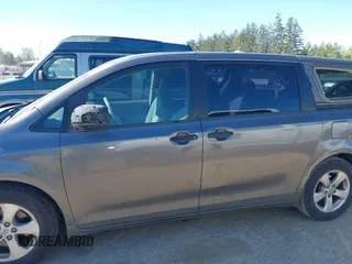 2013 Toyota Sienna L with VIN 5TDZK3DC1DS400675, listed as a IAAI auction lot 42053231 with 85,070 mi miles. Bid and sale history available at carsss.com. Image 14.