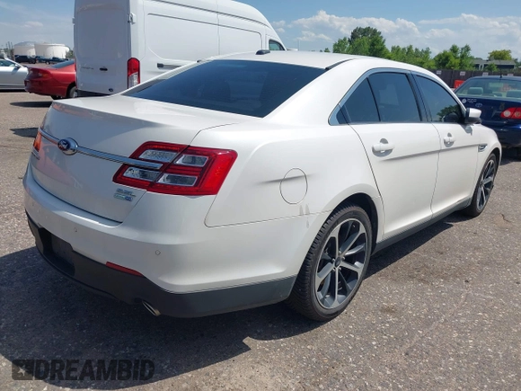 2015 Ford Taurus SEL with VIN 1FAHP2H8XFG203309, listed as a IAAI auction lot 42598215 with 163,190 mi miles and . Bid and sale history available at DreamBid. Image 4.