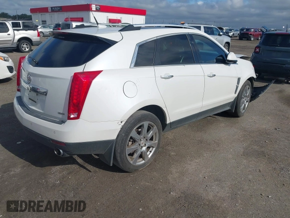 2012 Cadillac SRX Performance Collection with VIN 3GYFNBE34CS659748, listed as a IAAI auction lot 42693814 with 216,854 mi miles and . Bid and sale history available at DreamBid. Image 4.