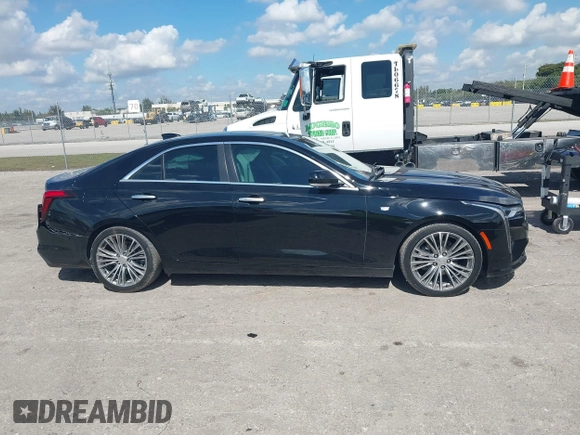 2021 Cadillac CT4 Premium Luxury with VIN 1G6DB5RK1M0132254, listed as a IAAI auction lot 41548569 with 61,862 mi miles and . Bid and sale history available at DreamBid. Image 14.