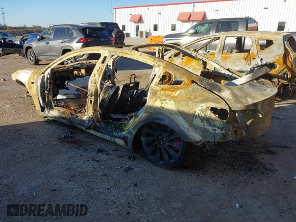 2022 Tesla Model 3 Performance with VIN 5YJ3E1EC3NF320980, listed as a IAAI auction lot 41450357 with Not Provided miles and . Bid and sale history available at DreamBid. Image 3.