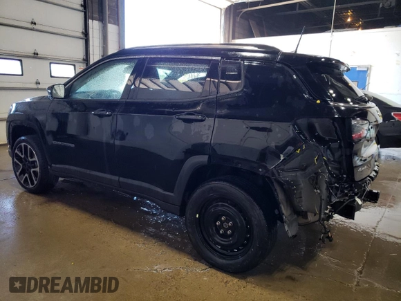 2018 Jeep Compass Limited with VIN 3C4NJDCB0JT401186, listed as a Copart auction lot 55660185 with 94,734 mi miles and Non repairable. Bid and sale history available at DreamBid. Image 2.