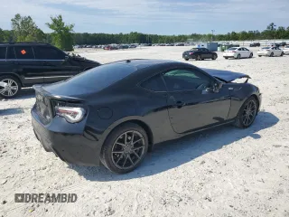 2014 Scion FR-S z VIN JF1ZNAA1XE8707871, wystawiony jako Copart lot #57945695 z przebiegiem 140 517 mil mil oraz Czysty tytuł • Clean title. Historia ofert i sprzedaży dostępna na DreamBid. Obrazek 3.