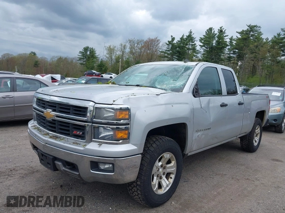 2014 Chevrolet Silverado 1500 LT with VIN 1GCVKREC8EZ151534, listed as a IAAI auction lot 42221023 with 216,835 mi miles and . Bid and sale history available at DreamBid. Image 2.