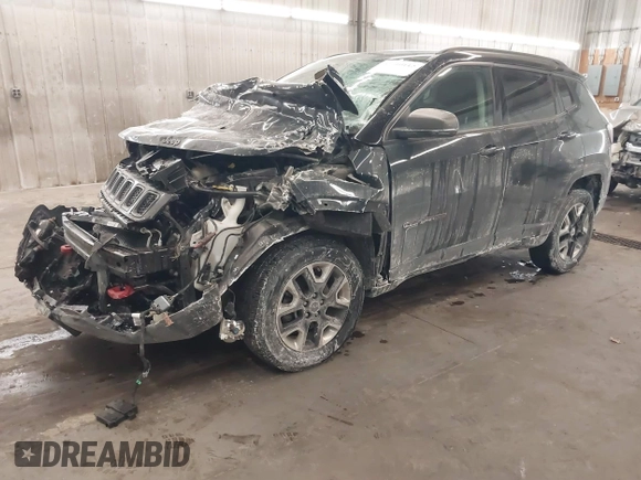 2018 Jeep Compass Trailhawk with VIN 3C4NJDDB2JT211775, listed as a IAAI auction lot 41610112 with 99,238 mi miles and . Bid and sale history available at DreamBid. Image 2.