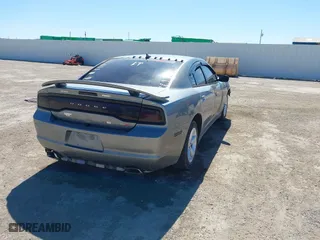 2014 Dodge Charger SE with VIN 2C3CDXBG1EH168709, listed as a IAAI auction lot 41872541 with 137,877 mi miles. Bid and sale history available at carsss.com. Image 4.