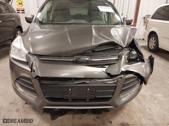 2014 Ford Escape SE with VIN 1FMCU9GX7EUA03627, listed as a IAAI auction lot 41728343 with 128,477 mi miles. Bid and sale history available at carsss.com. Image 6.