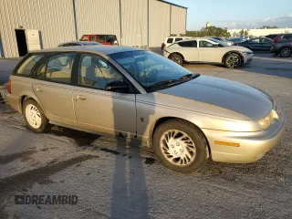 1998 Saturn SW z VIN 1G8ZK8271WZ220109, wystawiony jako Copart lot #76509884 z przebiegiem Nie podano mil oraz Nie do naprawy. Historia ofert i sprzedaży dostępna na DreamBid. Obrazek 4.