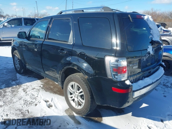 2010 Mercury Mariner Premier z VIN 4M2CN9HG8AKJ09388, wystawiony jako IAAI lot #41359539 z przebiegiem 73 077 mil mil oraz . Historia ofert i sprzedaży dostępna na DreamBid. Obrazek 3.