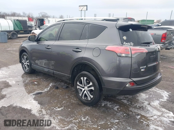 2016 Toyota RAV4 LE with VIN JTMZFREV5GJ093472, listed as a IAAI auction lot 41332037 with 212,869 mi miles. Bid and sale history available at carsss.com. Image 3.