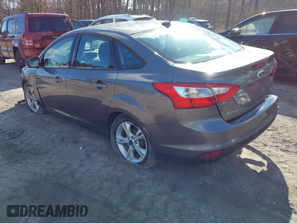 2014 Ford Focus SE with VIN 1FADP3F28EL424707, listed as a IAAI auction lot 42002883 with 115,746 mi miles. Bid and sale history available at carsss.com. Image 3.
