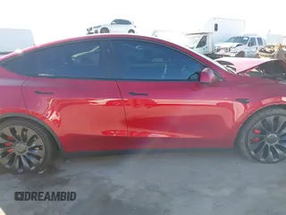 2024 Tesla Model Y Performance with VIN 7SAYGDEF3RF032980, listed as a IAAI auction lot 41619450 with 12,105 mi miles and . Bid and sale history available at DreamBid. Image 13.
