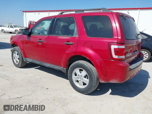 2011 Ford Escape XLT with VIN 1FMCU0D70BKC18662, listed as a IAAI auction lot 41769355 with 173,040 mi miles. Bid and sale history available at carsss.com. Image 3.