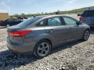 2018 Ford Focus SE с VIN 1FADP3FE5JL312063, выставлен на аукционе Copart как лот 53882065 с пробегом 82 743 миль миль и Списание • Salvage title. История ставок и продаж доступна на DreamBid. Изображение 3.