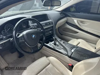 2012 BMW 6 Series 650i xDrive with VIN WBALX5C54CC894131, listed as a IAAI auction lot 42165498 with 82,800 mi miles. Bid and sale history available at carsss.com. Image 5.