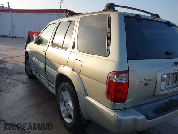 2001 Infiniti QX4 Luxury z VIN JNRDR07XX1W101118, wystawiony jako IAAI lot #41798112 z przebiegiem 184 082 mil mil oraz . Historia ofert i sprzedaży dostępna na DreamBid. Obrazek 3.