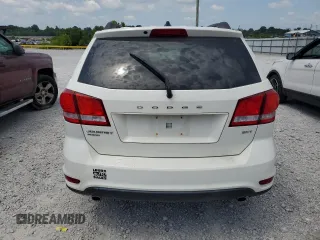 2013 Dodge Journey SXT with VIN 3C4PDDBG5DT615205, listed as a Copart auction lot 66553265 with 140,306 mi miles and Clean title. Bid and sale history available at DreamBid. Image 6.