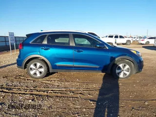 2019 Kia Niro LX with VIN KNDCB3LCXK5248552, listed as a IAAI auction lot 41724724 with 104,546 mi miles and . Bid and sale history available at DreamBid. Image 13.