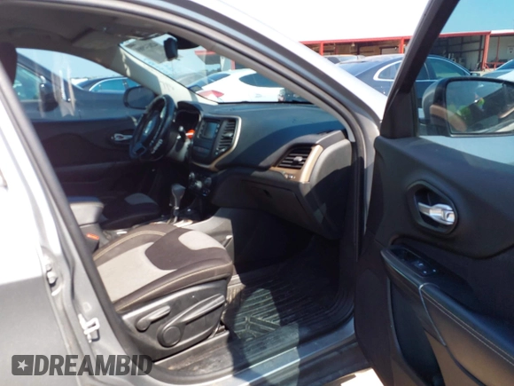 2014 Jeep Cherokee Latitude with VIN 1C4PJMCB4EW315520, listed as a IAAI auction lot 42034989 with 215,758 mi miles and . Bid and sale history available at DreamBid. Image 5.