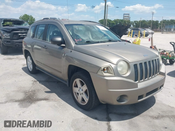 2008 Jeep Compass Sport with VIN 1J8FT47068D593407, listed as a IAAI auction lot 42188334 with 99,736 mi miles. Bid and sale history available at carsss.com. Image 1.