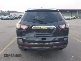 2015 Chevrolet Traverse LTZ with VIN 1GNKVJKDXFJ206159, listed as a IAAI auction lot 41762515 with 143,062 mi miles and . Bid and sale history available at DreamBid. Image 16.