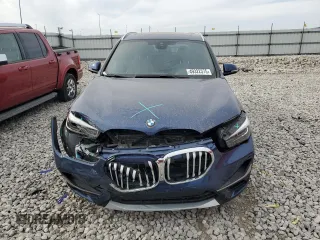 2021 BMW X1 xDrive28i z VIN WBXJG9C09M5T16797, wystawiony jako Copart lot #49322375 z przebiegiem 51 240 mil mil oraz Szkoda całkowita • Salvage title. Historia ofert i sprzedaży dostępna na DreamBid. Obrazek 5.