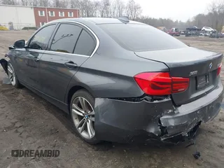 2018 BMW 3 Series with VIN WBA8F1C54JAE93207, listed as a IAAI auction lot 41876781 with 64,749 mi miles and . Bid and sale history available at DreamBid. Image 3.