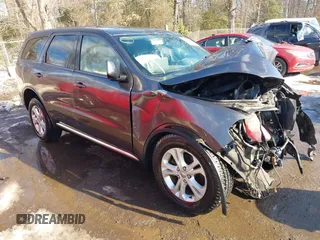2013 Dodge Durango SXT with VIN 1C4RDHAG8DC687724, listed as a IAAI auction lot 41306611 with 106,897 mi miles and . Bid and sale history available at DreamBid. Image 1.