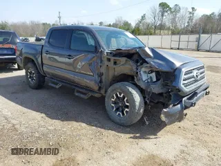 2016 Toyota Tacoma SR with VIN 5TFCZ5AN5GX010227, listed as a IAAI auction lot 41792719 with 228,070 mi miles. Bid and sale history available at carsss.com. Image 1.