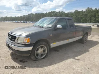 2002 Ford F-150 XL z VIN 1FTRX17L62NA72237, wystawiony jako Copart lot #56507915 z przebiegiem Nie podano mil oraz Szkoda całkowita • Salvage title. Historia ofert i sprzedaży dostępna na DreamBid. Obrazek 1.