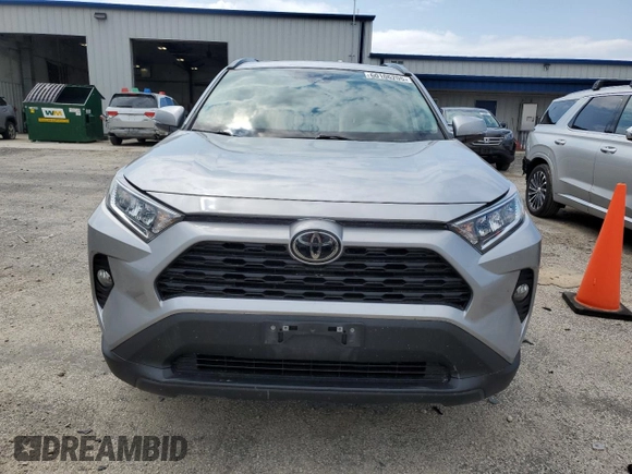 2021 Toyota RAV4 XLE Premium с VIN 2T3A1RFV3MC187245, выставлен на аукционе Copart как лот 60106205 с пробегом 104 373 миль миль и Списание • Salvage title. История ставок и продаж доступна на DreamBid. Изображение 5.