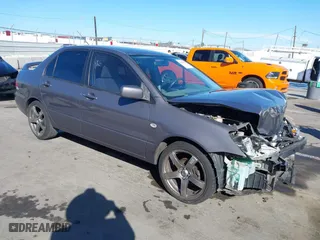 2005 Mitsubishi Lancer ES with VIN JA3AJ26E25U017526, listed as a IAAI auction lot 41680488 with 166,175 mi miles. Bid and sale history available at carsss.com. Image 1.