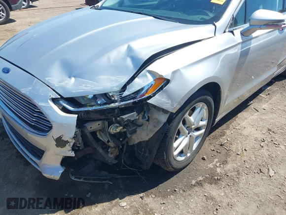 2013 Ford Fusion SE z VIN 3FA6P0HR2DR163219, wystawiony jako IAAI lot #42255313 z przebiegiem 86 631 mil mil oraz . Historia ofert i sprzedaży dostępna na DreamBid. Obrazek 6.