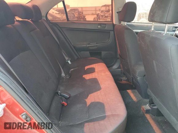 2015 Mitsubishi Lancer ES with VIN JA32U2FU2FU008586, listed as a Copart auction lot 70018914 with 129,990 mi miles and Salvage Title. Bid and sale history available at carsss.com. Image 10.