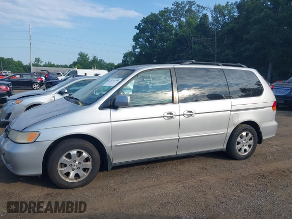 2003 Honda Odyssey EX-L with VIN 5FNRL18913B061340, listed as a IAAI auction lot 42633790 with 1,281,195 mi miles and . Bid and sale history available at DreamBid. Image 13.