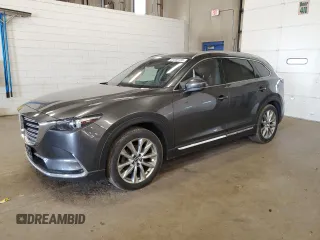 2016 Mazda CX-9 Signature with VIN JM3TCBEY6G0109918, listed as a Copart auction lot 59388185 with 153,626 mi miles and Salvage title. Bid and sale history available at DreamBid. Image 1.