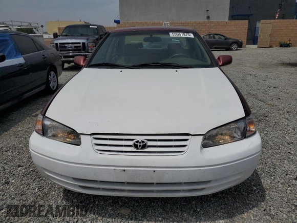 1999 Toyota Camry LE z VIN JT2BF22K8X0181675, wystawiony jako Copart lot #55057875 z przebiegiem 184 657 mil mil oraz Szkoda całkowita • Salvage title. Historia ofert i sprzedaży dostępna na DreamBid. Obrazek 5.
