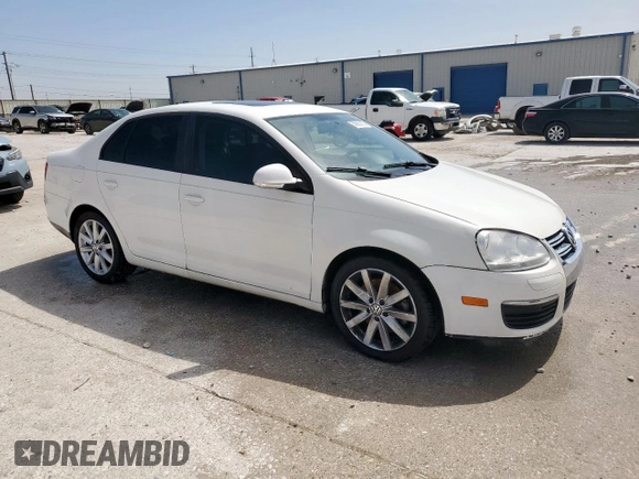 2010 Volkswagen Jetta Wolfsburg Edition with VIN 3VWRA7AJ0AM156555, listed as a Copart auction lot 56982155 with 72,054 mi miles and Salvage title. Bid and sale history available at DreamBid. Image 4.