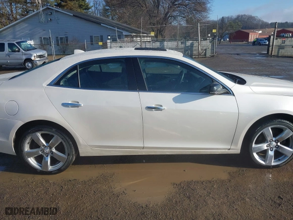 2013 Chevrolet Malibu LTZ with VIN 1G11J5SX3DF264883, listed as a IAAI auction lot 41636700 with 166,412 mi miles. Bid and sale history available at carsss.com. Image 14.