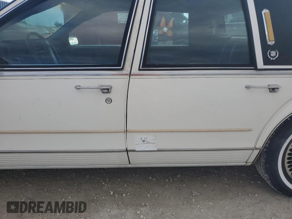 1987 Cadillac Seville z VIN 1G6KS518XHU812739, wystawiony jako Copart lot #79308574 z przebiegiem Nie podano mil oraz Szkoda całkowita • Salvage title. Historia ofert i sprzedaży dostępna na DreamBid. Obrazek 12.