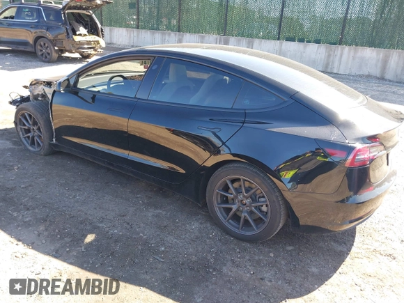 2023 Tesla Model 3 Long Range with VIN 5YJ3E1EB1PF632595, listed as a IAAI auction lot 41754131 with 8,147 mi miles and . Bid and sale history available at DreamBid. Image 3.
