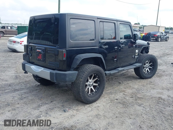 2012 Jeep Wrangler Unlimited Sahara with VIN 1C4HJWEG0CL168300, listed as a IAAI auction lot 42430678 with 70,000 mi miles and . Bid and sale history available at DreamBid. Image 4.