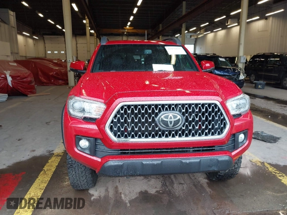 2019 Toyota Tacoma SR z VIN 3TMCZ5AN5KM220079, wystawiony jako IAAI lot #41856695 z przebiegiem 51 918 mil mil oraz . Historia ofert i sprzedaży dostępna na DreamBid. Obrazek 12.